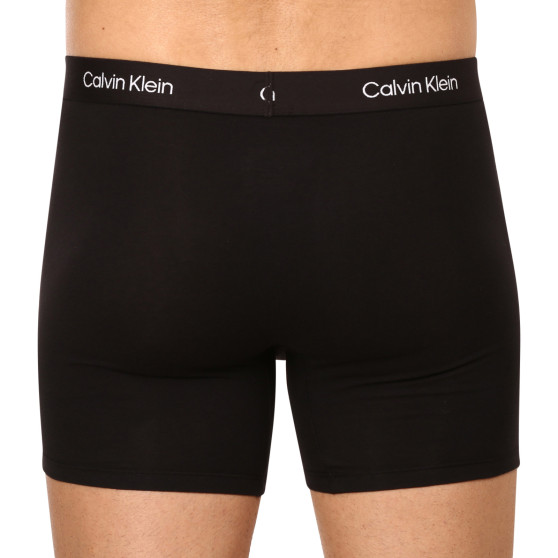 3PACK Мъжки боксерки Calvin Klein черено (NB3529A-UB1)