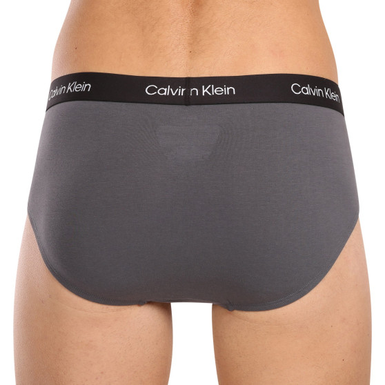 7PACK Мъжки слипове Calvin Klein многоцветен (NB3581A-IUI)