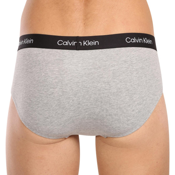 7PACK Мъжки слипове Calvin Klein многоцветен (NB3581A-IUI)