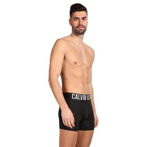 3PACK Мъжки боксерки Calvin Klein черено (NB3612A-UB1)