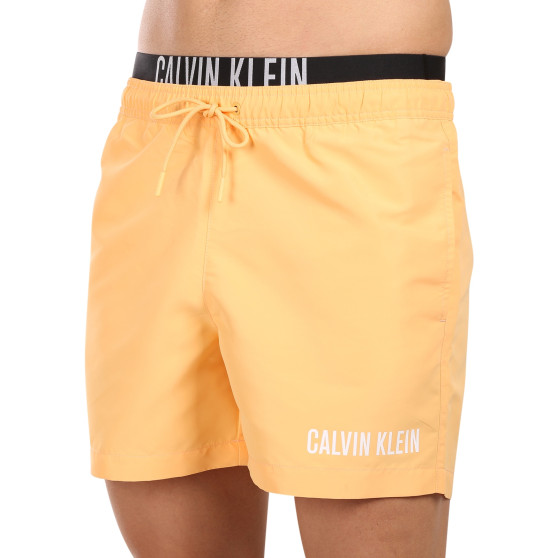 Мъжки бански костюми Calvin Klein оранжев (KM0KM00992-SAN)