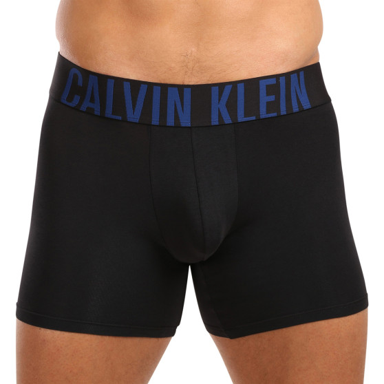 3PACK Мъжки боксерки Calvin Klein черено (NB3609A-LXT)