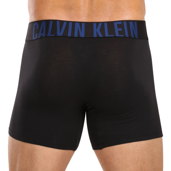 3PACK Мъжки боксерки Calvin Klein черено (NB3609A-LXT)