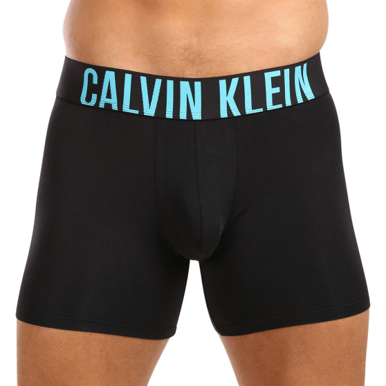 3PACK Мъжки боксерки Calvin Klein черено (NB3609A-LXT)