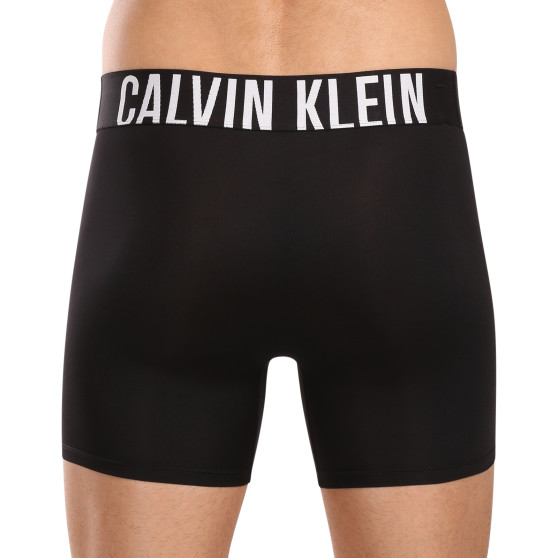 3PACK Мъжки боксерки Calvin Klein черено (NB3612A-Q1L)