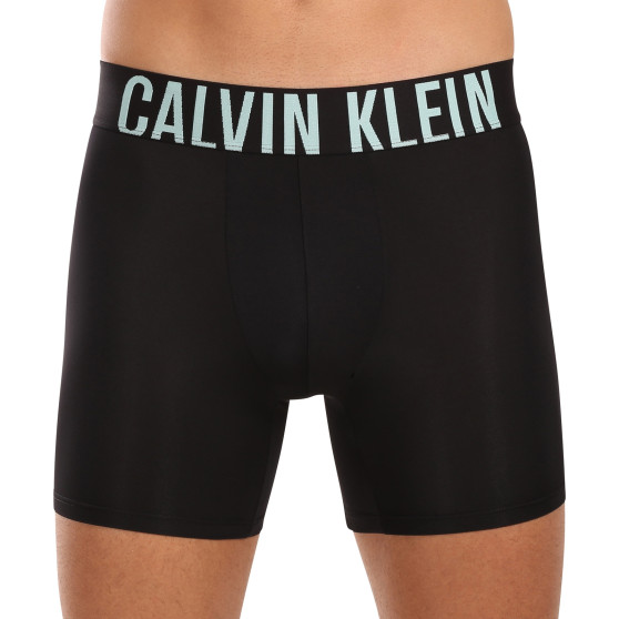 3PACK Мъжки боксерки Calvin Klein черено (NB3612A-Q1L)