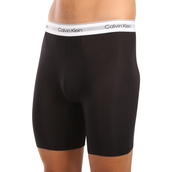 3PACK Мъжки боксерки Calvin Klein черено (NB3955A-UB1)