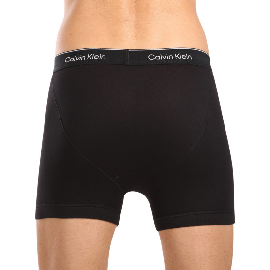 3PACK Мъжки боксерки Calvin Klein черено (NB4003A-001)